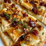 Crispy Flatbread with Brie, Cranberries & Toasted Walnuts with a Hot Honey Drizzle