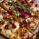 Crispy Flatbread with Brie, Pomegranate Seeds & Toasted Walnuts with Hot Honey