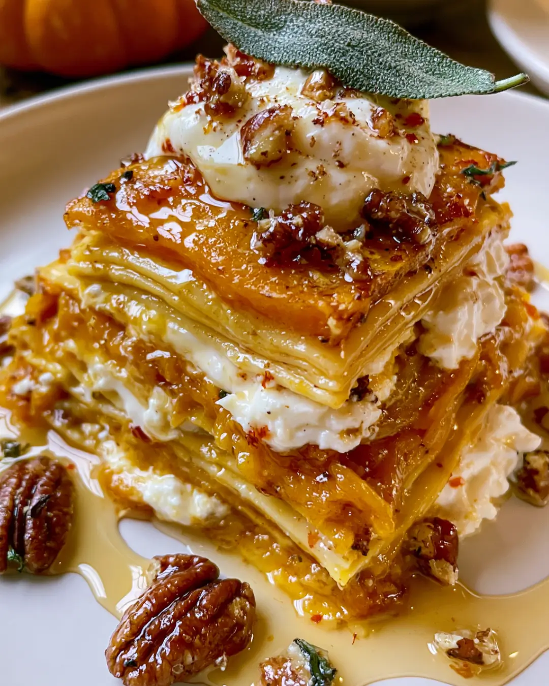 Golden Pumpkin Lasagna with Burrata, Crispy Sage, Pecans & Hot Honey