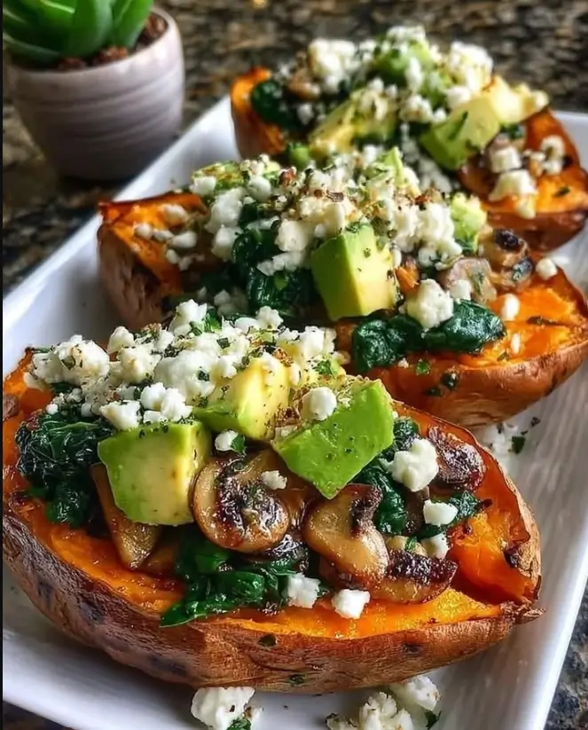 Loaded Crispy Sweet Potatoes with Whipped Feta, Sautéed Spinach, Mushrooms & Avocado