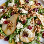 Pear, Rocket & Goat Cheese Salad with Toasted Walnuts, Cranberries & Maple Dijon Dressing