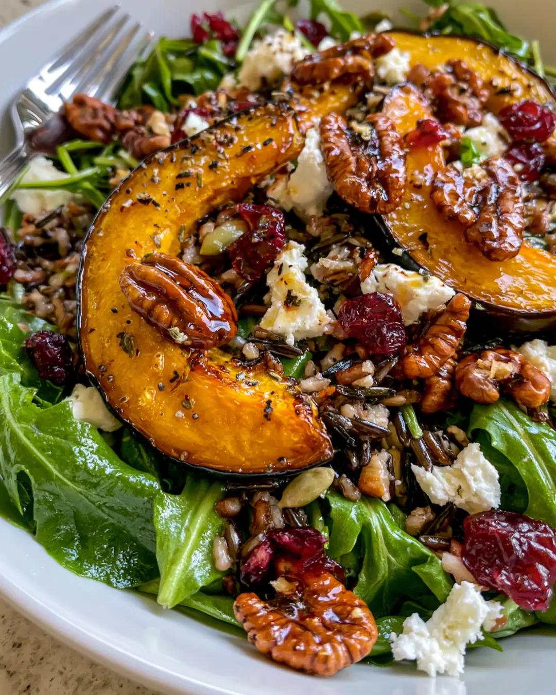 Roasted Acorn Squash Salad with Wild Rice, Cranberries, Feta & Maple Pecans